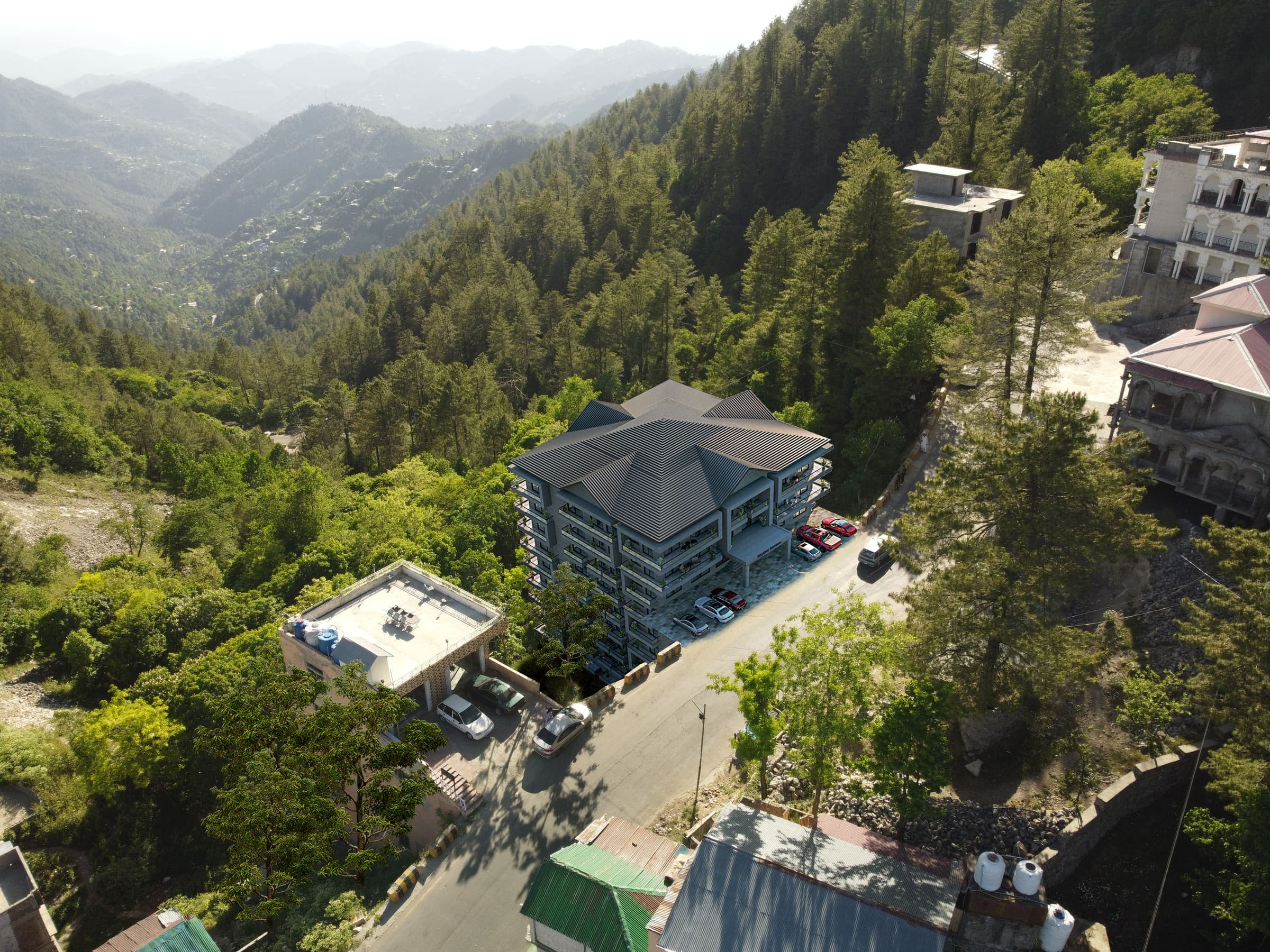 Aerial view of Skyline Terrace beside the road, with forested valleys stretching away